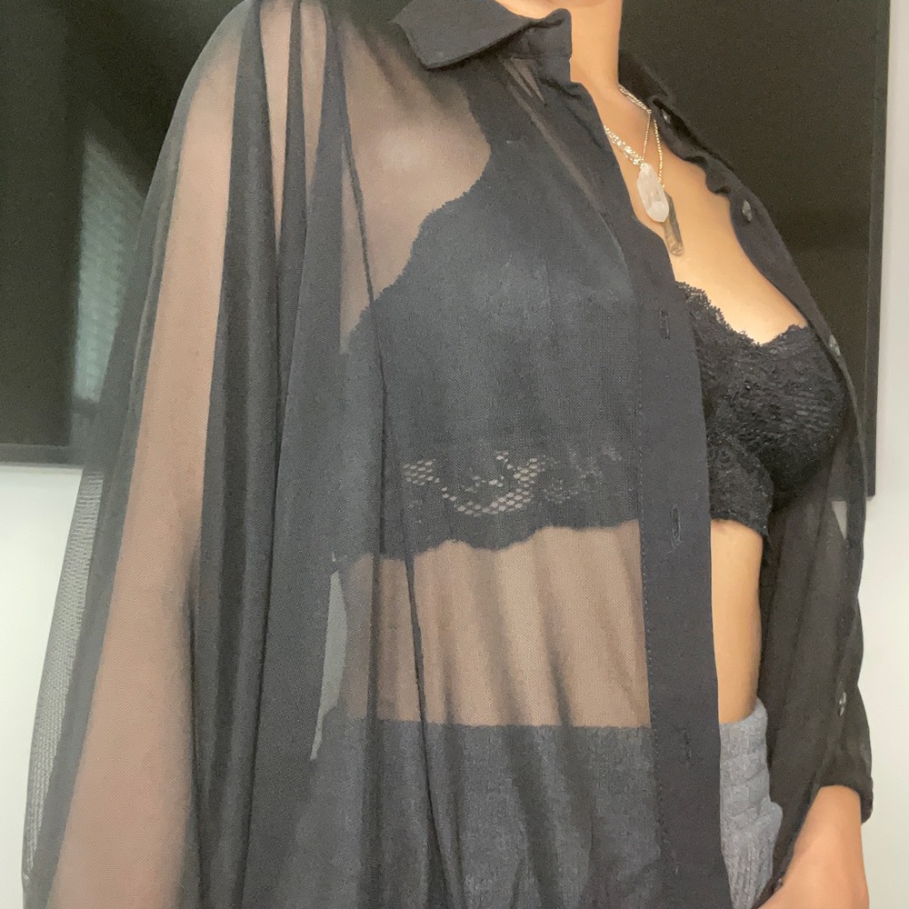 Sheer black blouse